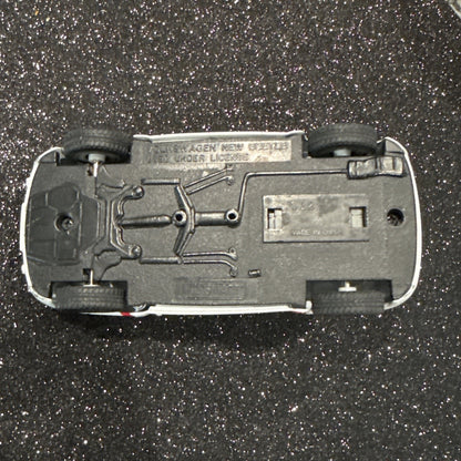 Kinsmart 1 / 32nd Volkswagen New Beetle, friction vehicle.
