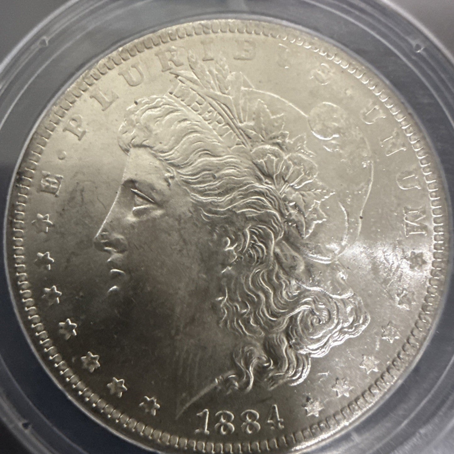 1884 O Morgan Dollar MS 62 ANACS Silver Uncirculated - toyscardscomics