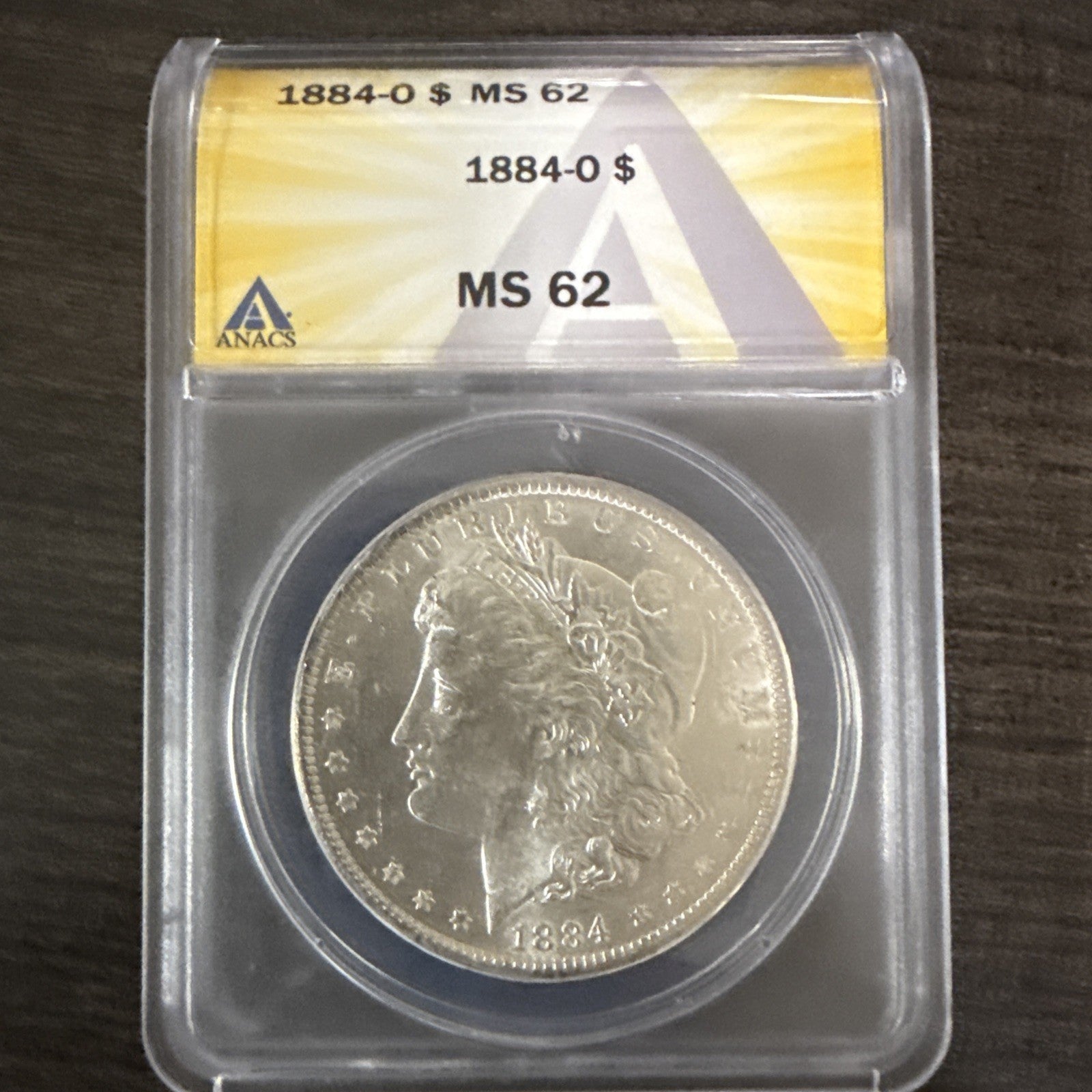 1884 O Morgan Dollar MS 62 ANACS Silver Uncirculated - toyscardscomics