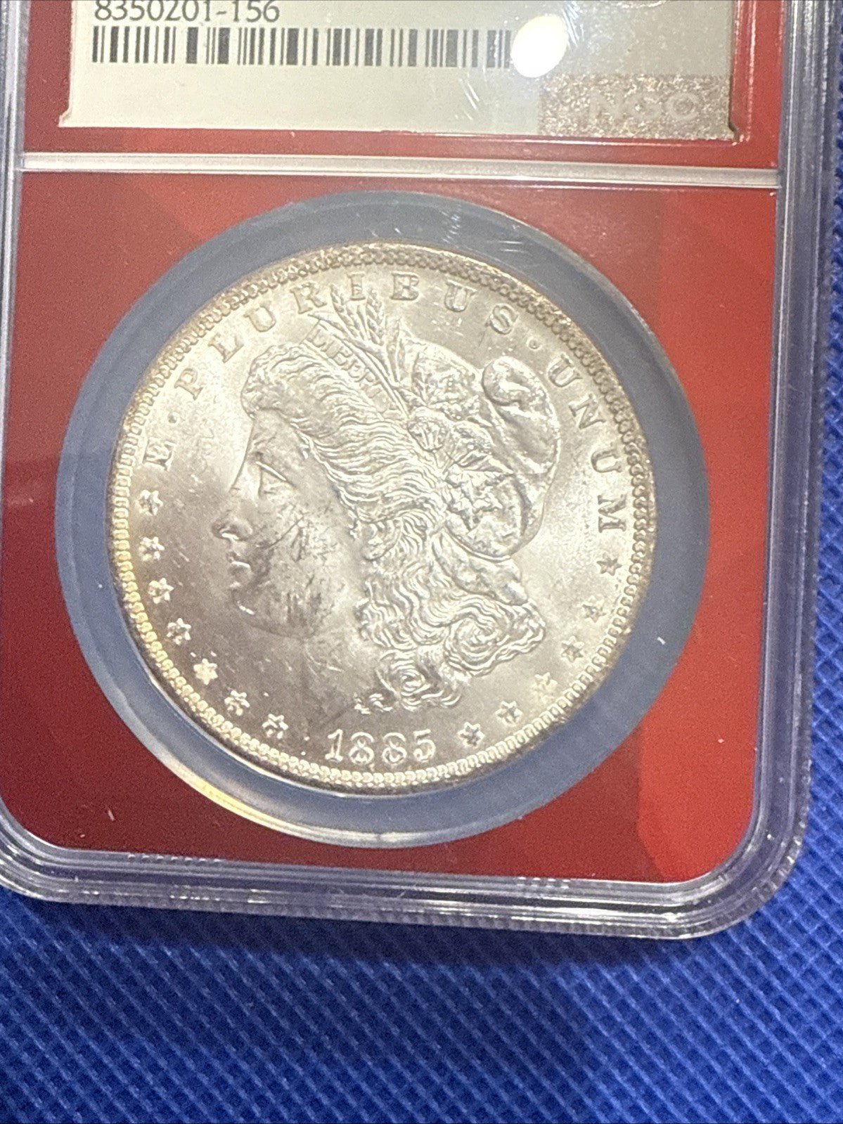 1885 O $1 MS 62 EDC NGC - toyscardscomics