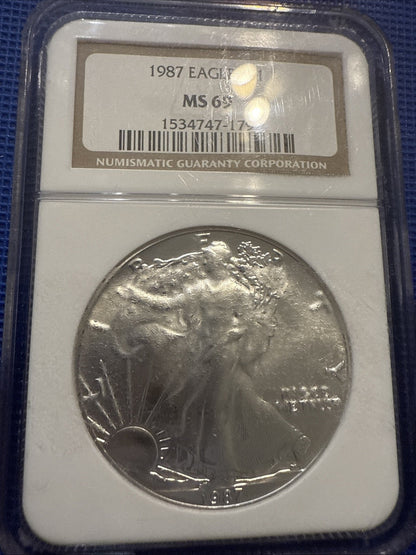 1987 American Silver $1 Eagle Coin NGC MS 69 - toyscardscomics
