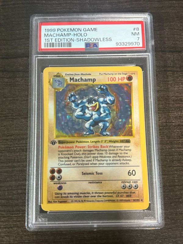 1999 Pokemon Game Machamp - Holo 1st Edition - Shadowless - toyscardscomics