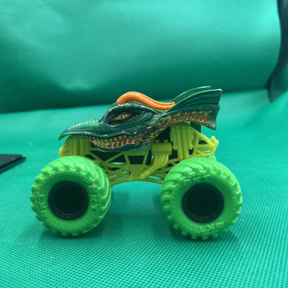 Monster Jam Dragon Truck Green tires yellow cage 1:64