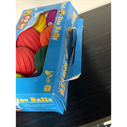 Mel-O-Dee Balls Diatonic Squeeze Ball Set. 8 Balls With Sheet Music.