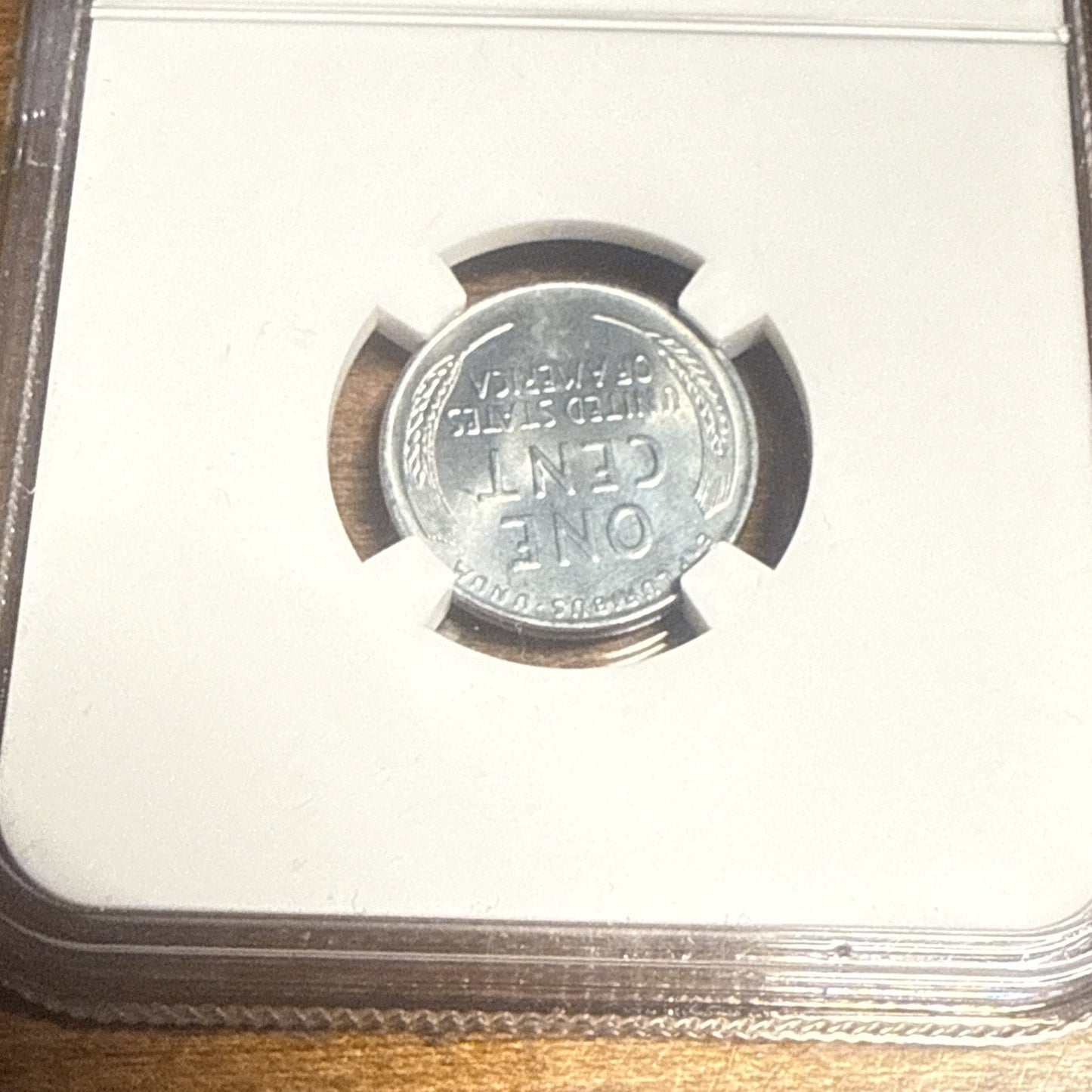 1943 D Lincoln Wheat Steel Cent NGC MS 65 with Parachute Fragment -WW II Era