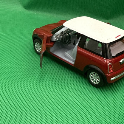 KINSMART NEW MINI COOPER DIECAST CAR 1:28 scale RED.