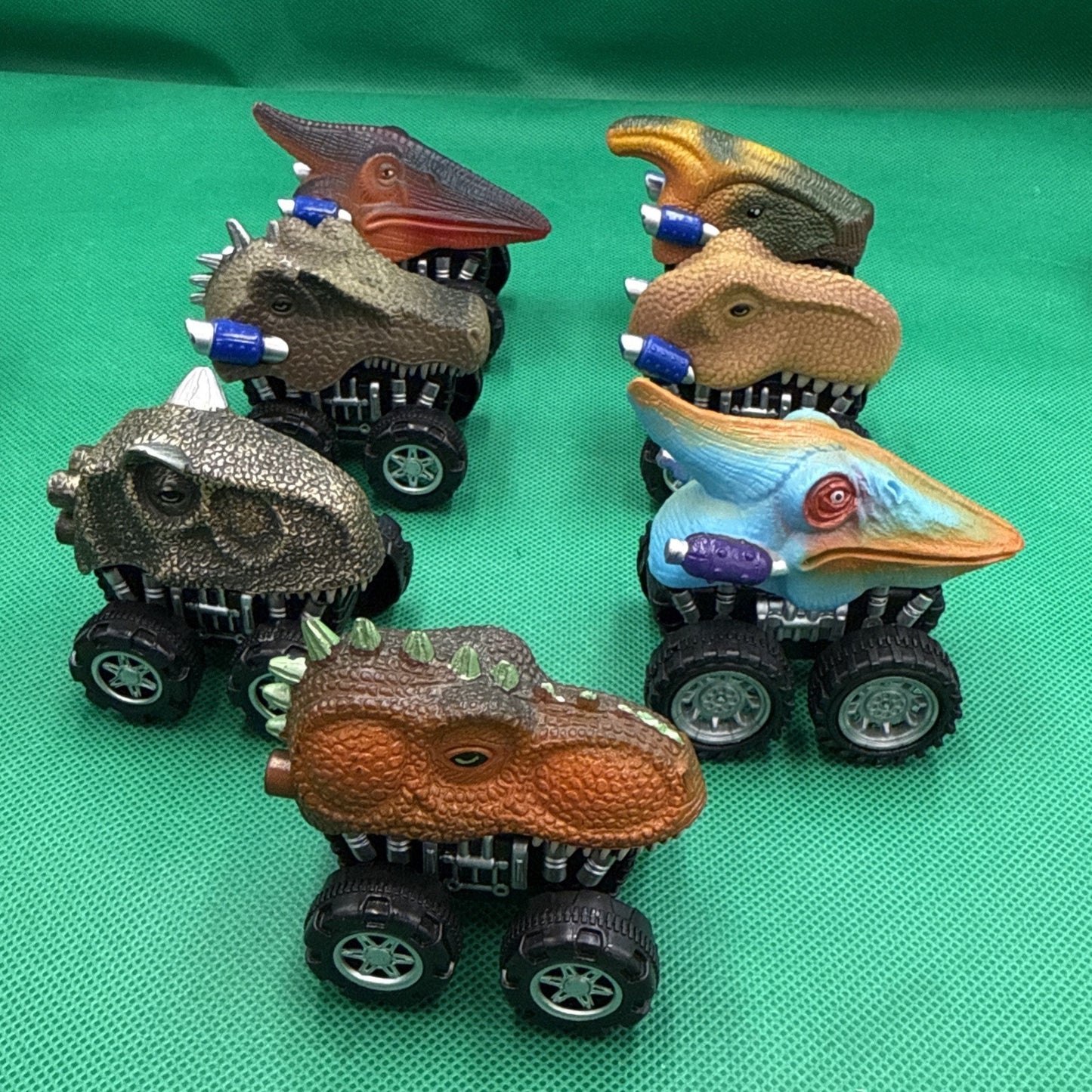 Lot Of 7 Dinosaur Head Pull Back Wind Up Monster Trucks T-Rex, Triceratop & More