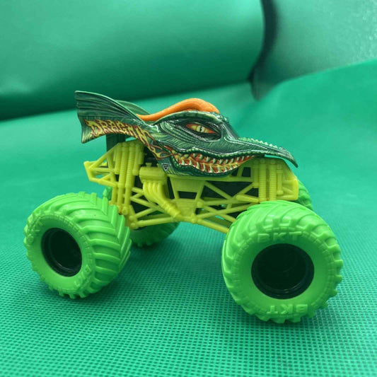 Monster Jam Dragon Truck Green tires yellow cage 1:64