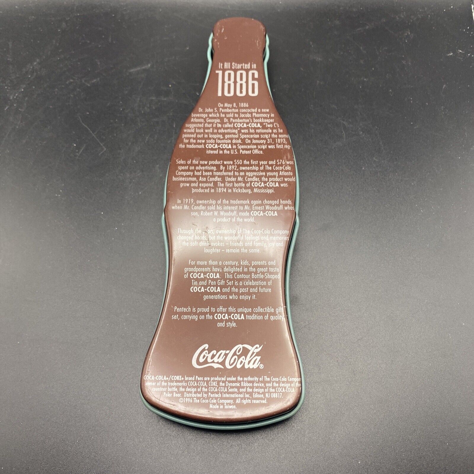 Coca Cola Bottle Shaped Tin Box with Pen 1886 Coke Began - toyscardscomics