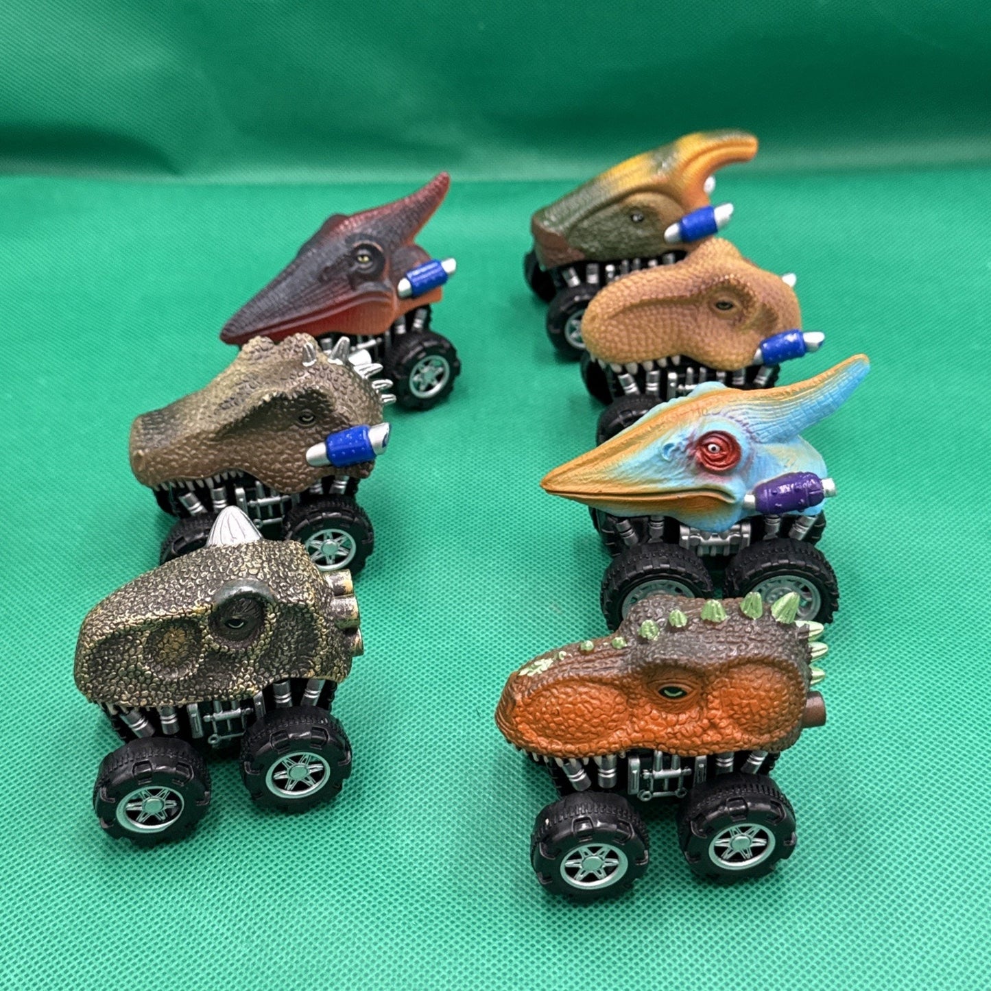 Lot Of 7 Dinosaur Head Pull Back Wind Up Monster Trucks T-Rex, Triceratop & More