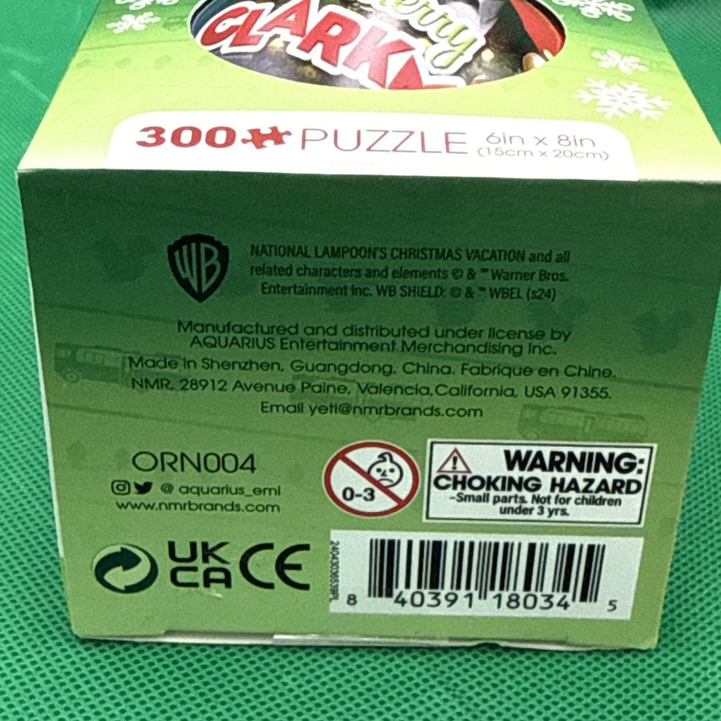 Elf in Tin Globe 300 - Piece Holiday Puzzle - toyscardscomics