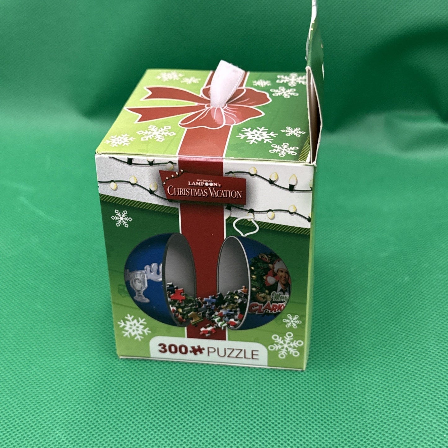 Elf in Tin Globe 300 - Piece Holiday Puzzle - toyscardscomics