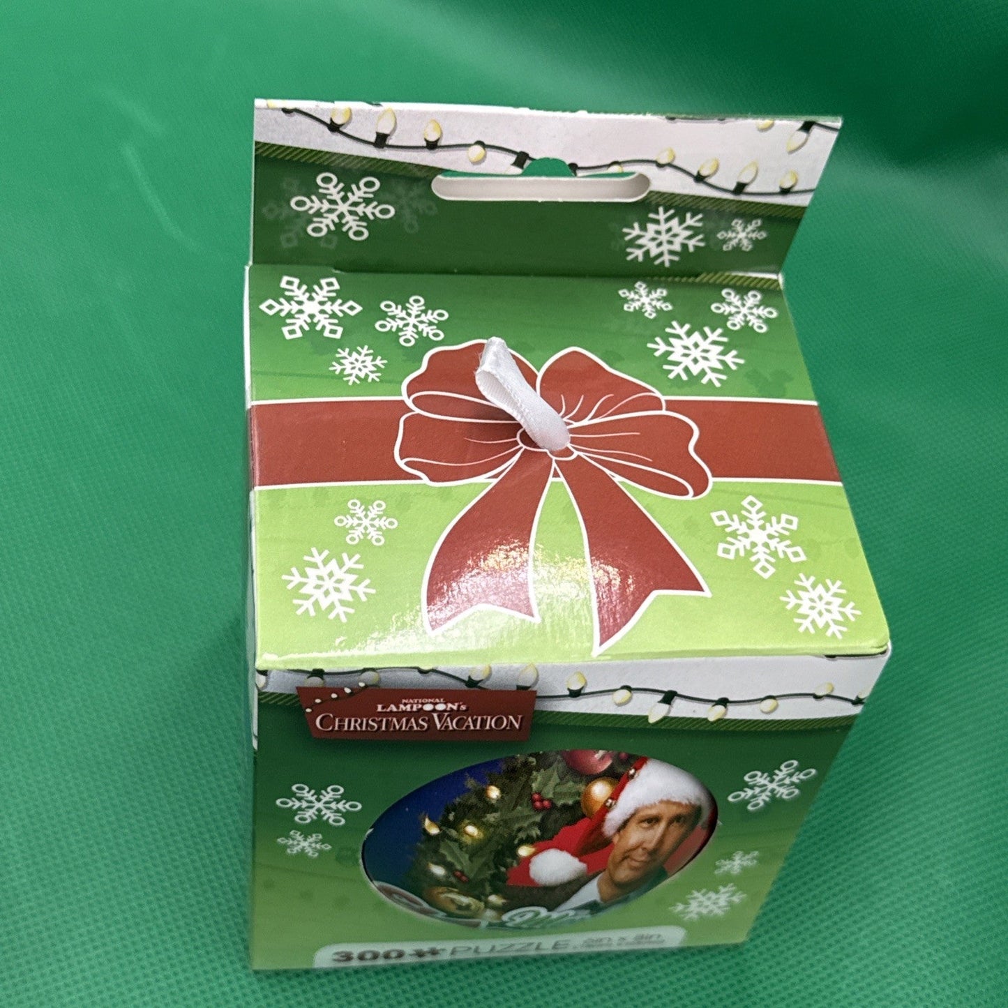 Elf in Tin Globe 300 - Piece Holiday Puzzle - toyscardscomics