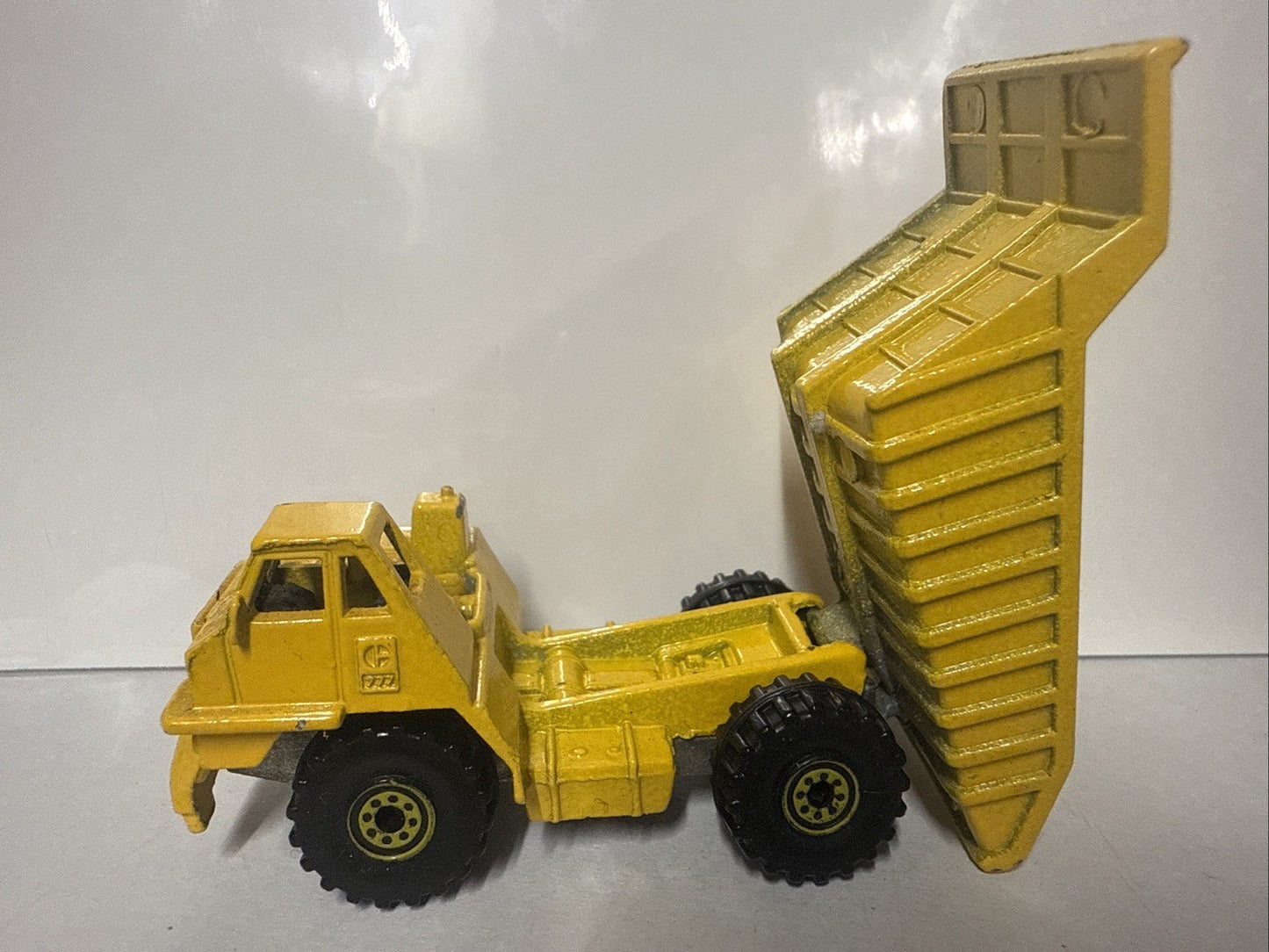 Hot Wheels Loose - Yellow Dump Truck w/ Plastic Bed - toyscardscomics