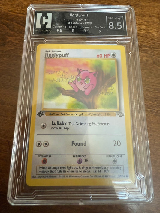 Jigglypuff Jungle (54/64) 1st Edition 1999 - toyscardscomics