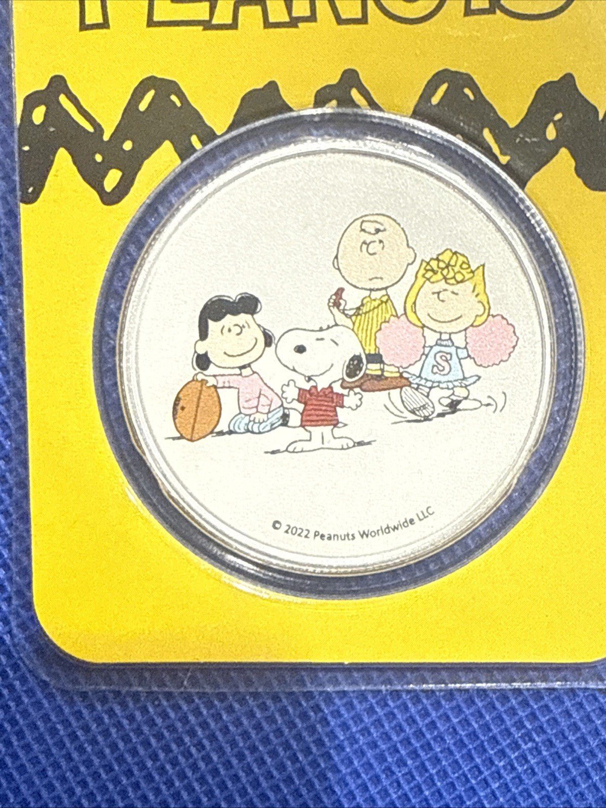 Peanuts® Football Season 1 oz Colorized Silver Uncirculated - toyscardscomics