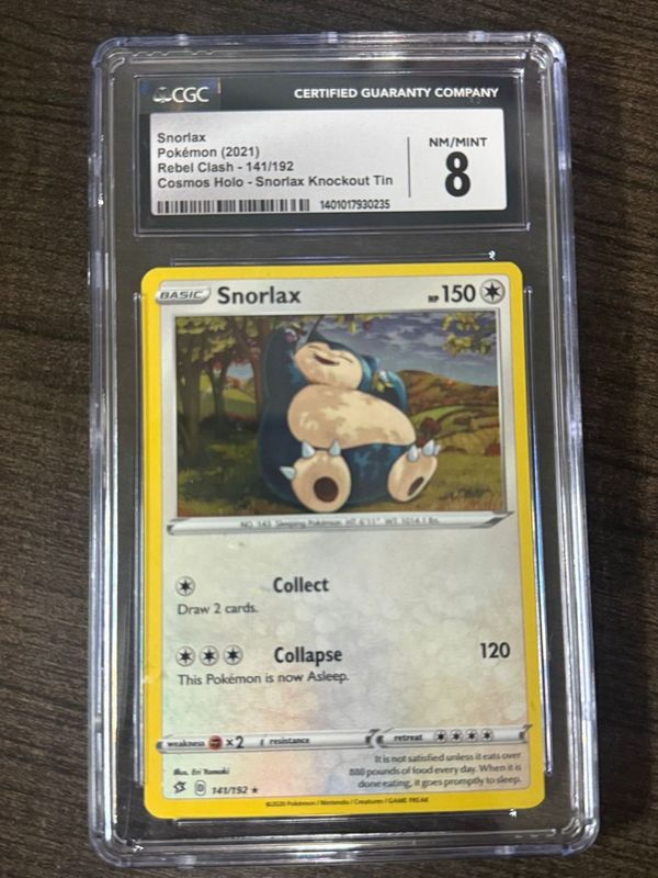 Snorlax Pokemon (2021) Rebel Cash - 141/192 Cosmos Holo - Snortax Knockout Tin - toyscardscomics