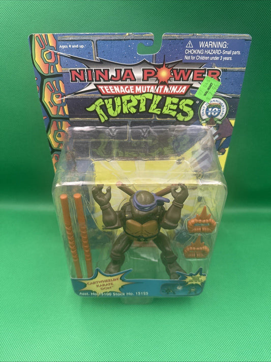 Teenage Mutant Ninja Turtles CARTWHEELIN KARATE DON 1996 Playmates New Old Stock - toyscardscomics