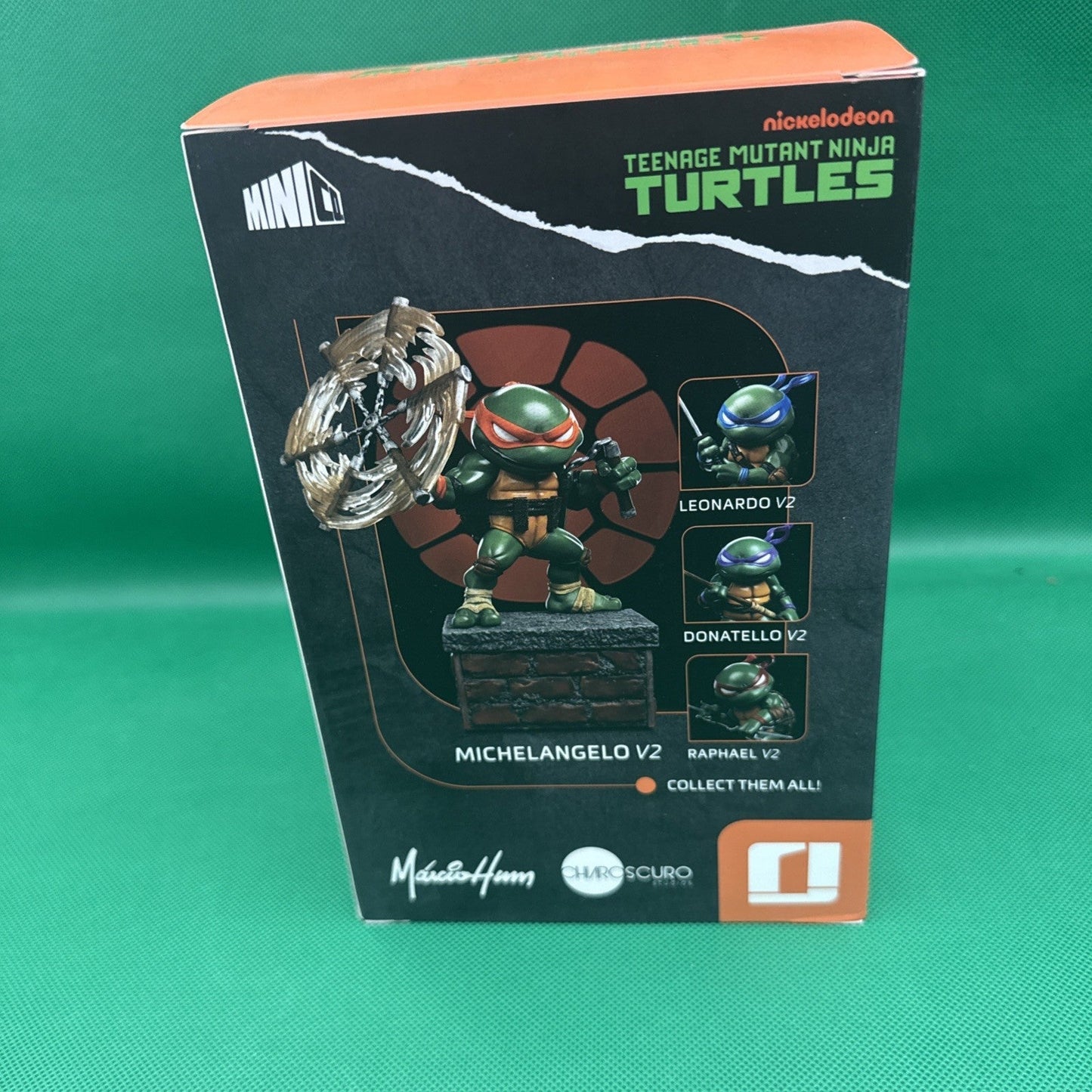 Teenage Mutant Ninja Turtles Michelangelo V2 SDCC 2023 Vinyl Fig. Iron Studios - toyscardscomics