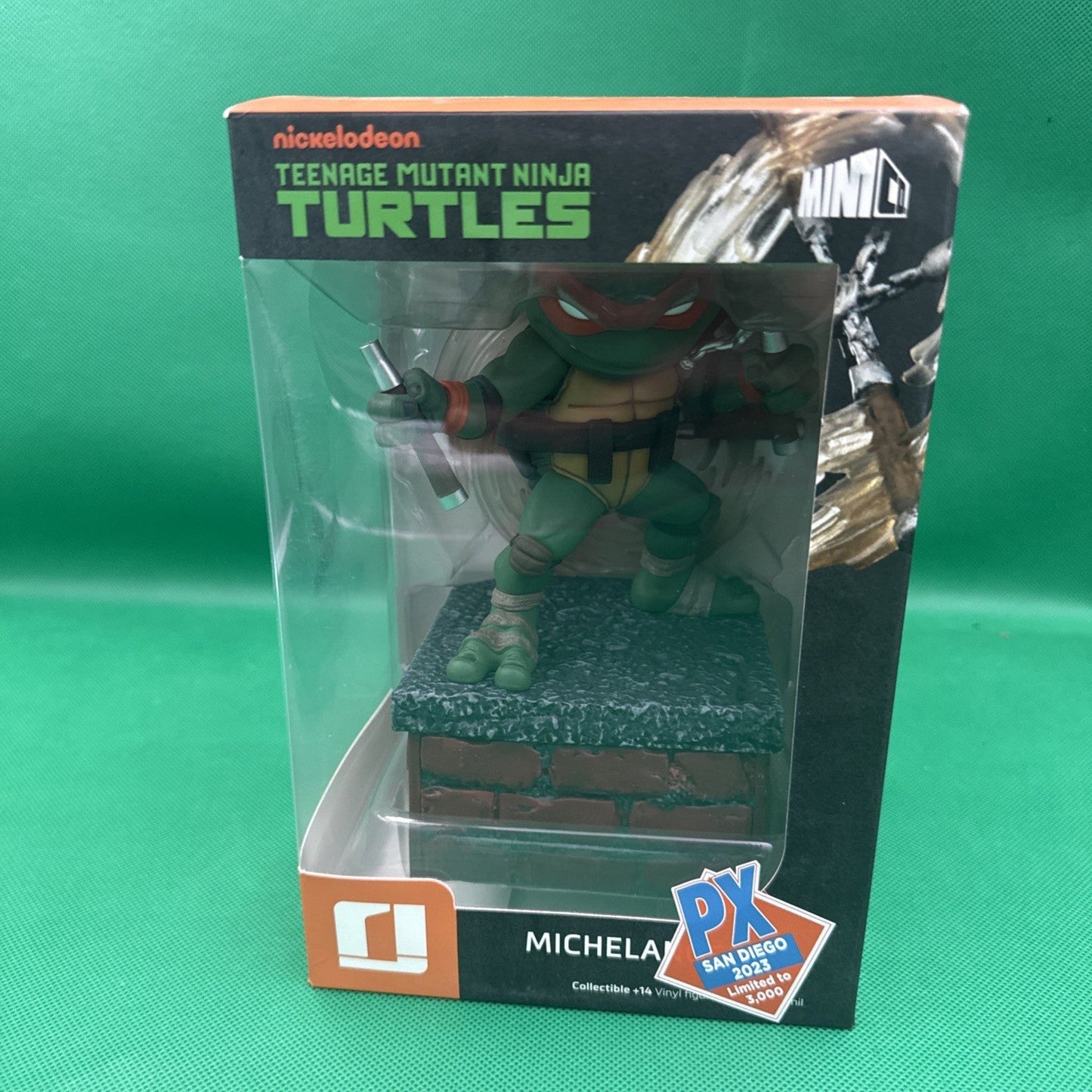 Teenage Mutant Ninja Turtles Michelangelo V2 SDCC 2023 Vinyl Fig. Iron Studios - toyscardscomics