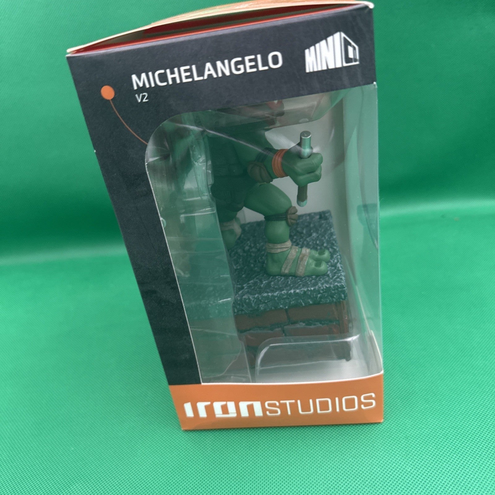 Teenage Mutant Ninja Turtles Michelangelo V2 SDCC 2023 Vinyl Fig. Iron Studios - toyscardscomics