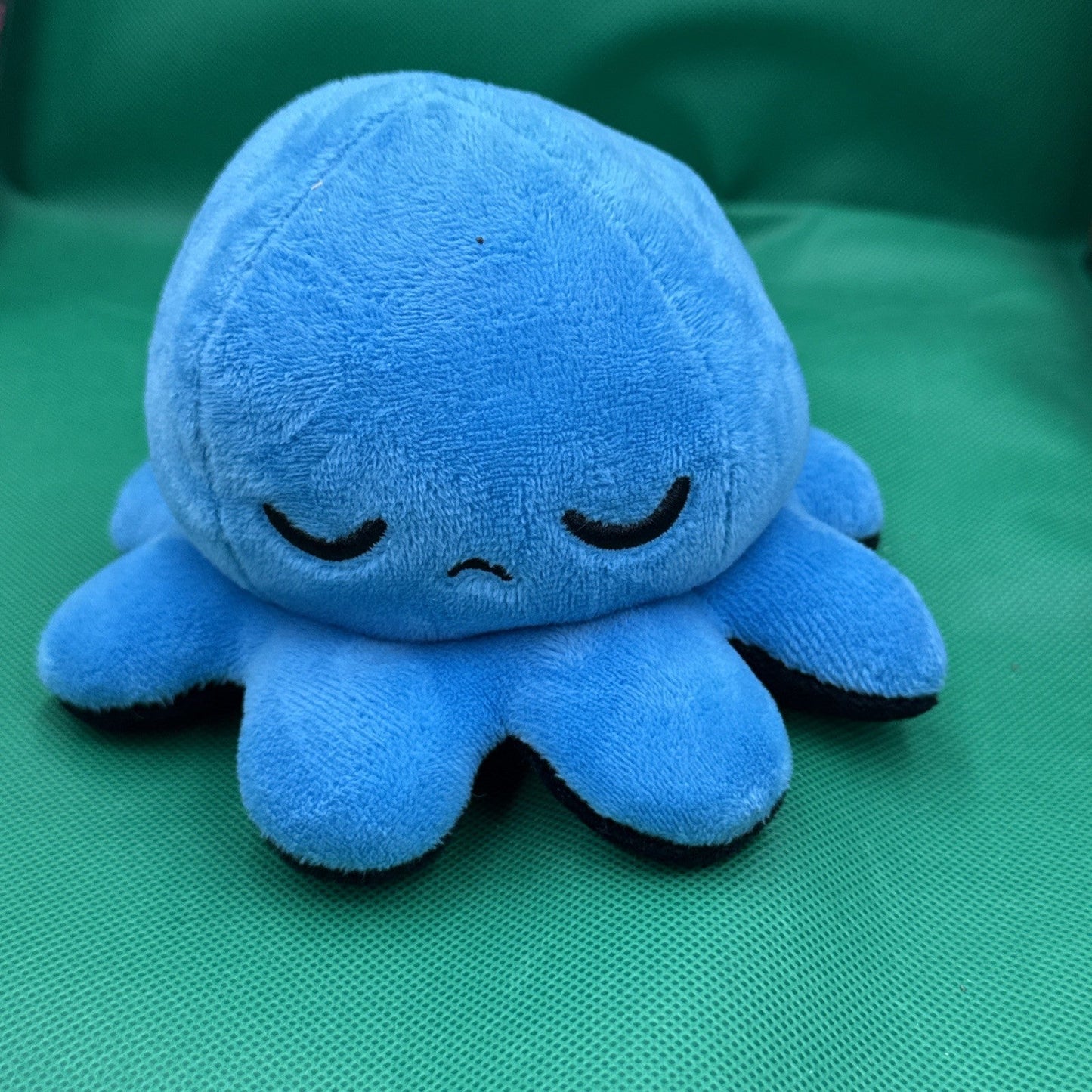 TeeTurtle Reversible Octopus Plush Orange And Black, Grumpy Angry blue sad - toyscardscomics