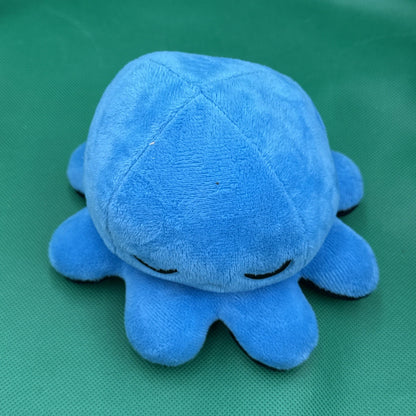 TeeTurtle Reversible Octopus Plush Orange And Black, Grumpy Angry blue sad - toyscardscomics