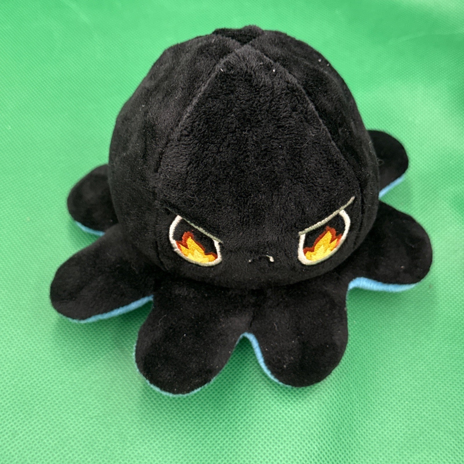 TeeTurtle Reversible Octopus Plush Orange And Black, Grumpy Angry blue sad - toyscardscomics