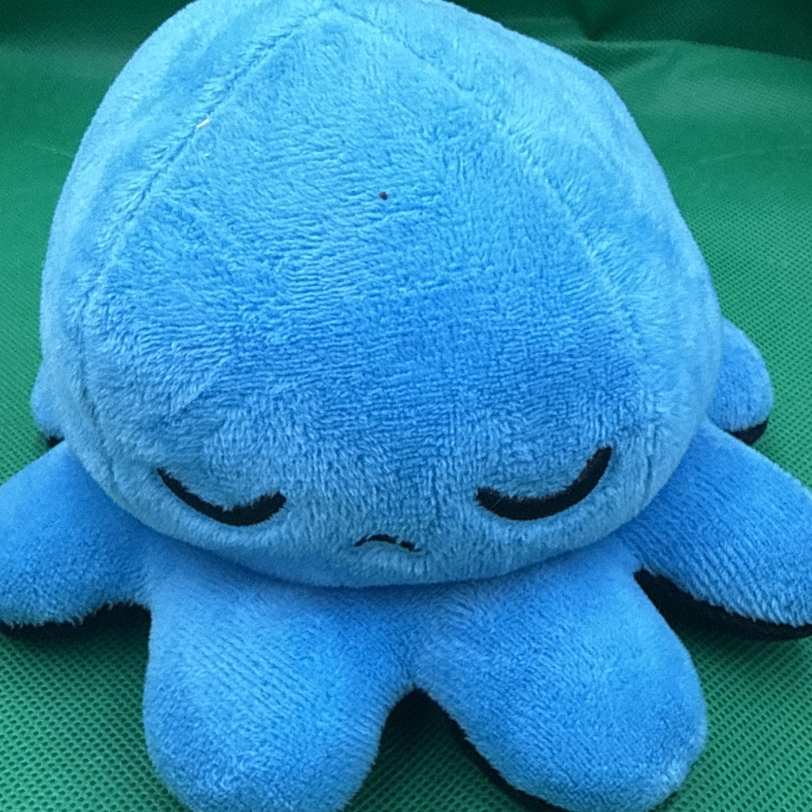 TeeTurtle Reversible Octopus Plush Orange And Black, Grumpy Angry blue sad - toyscardscomics